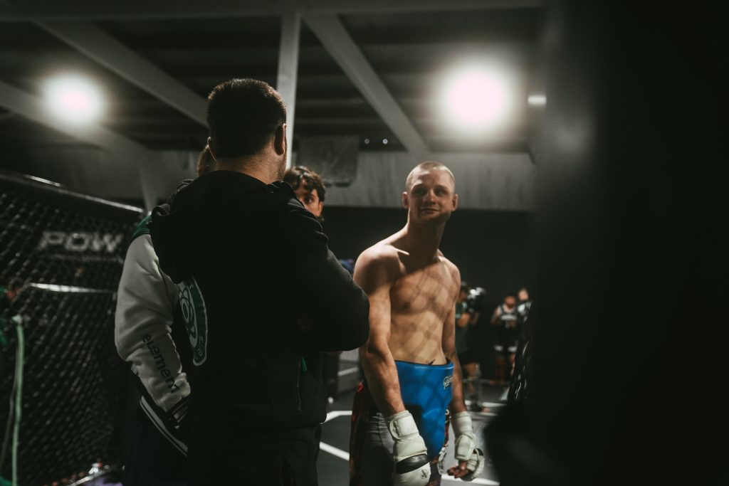 Coach of Element Martial Arts talking with Fighters